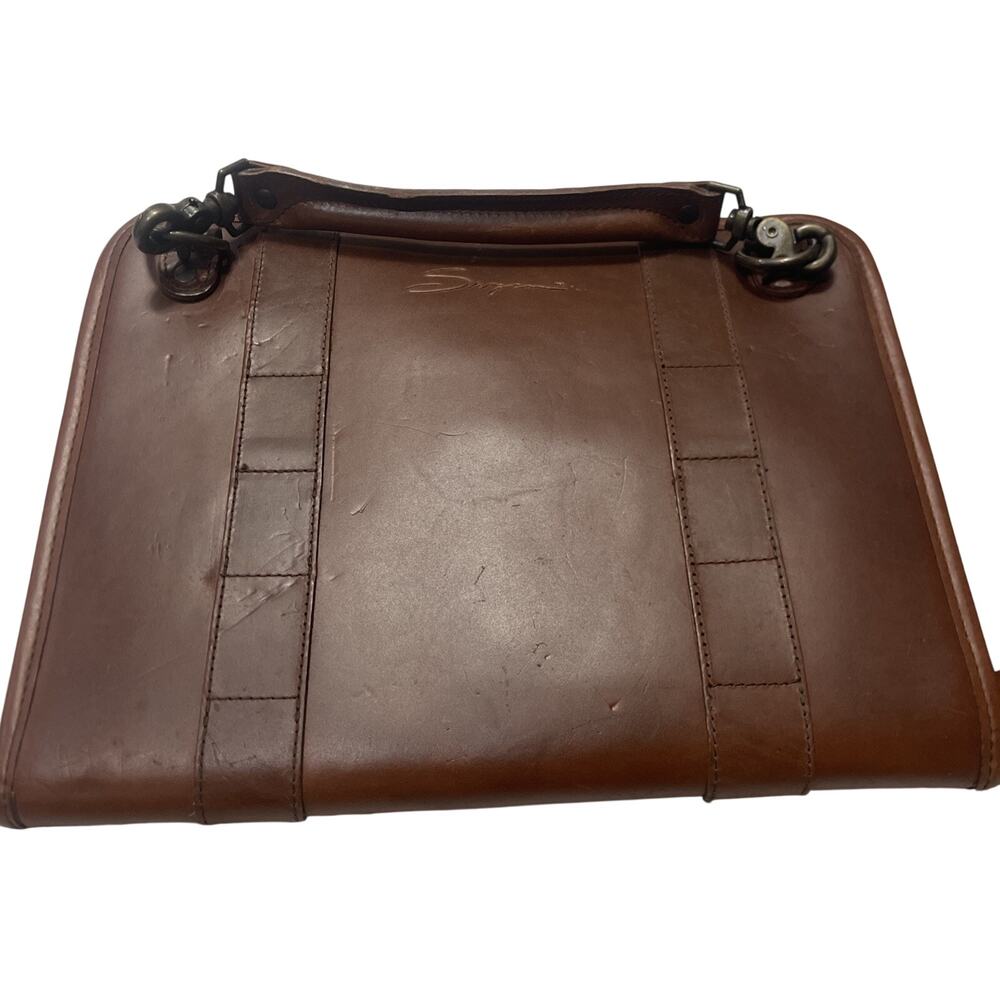 Brown leather portfolio with handle and embossed logo
